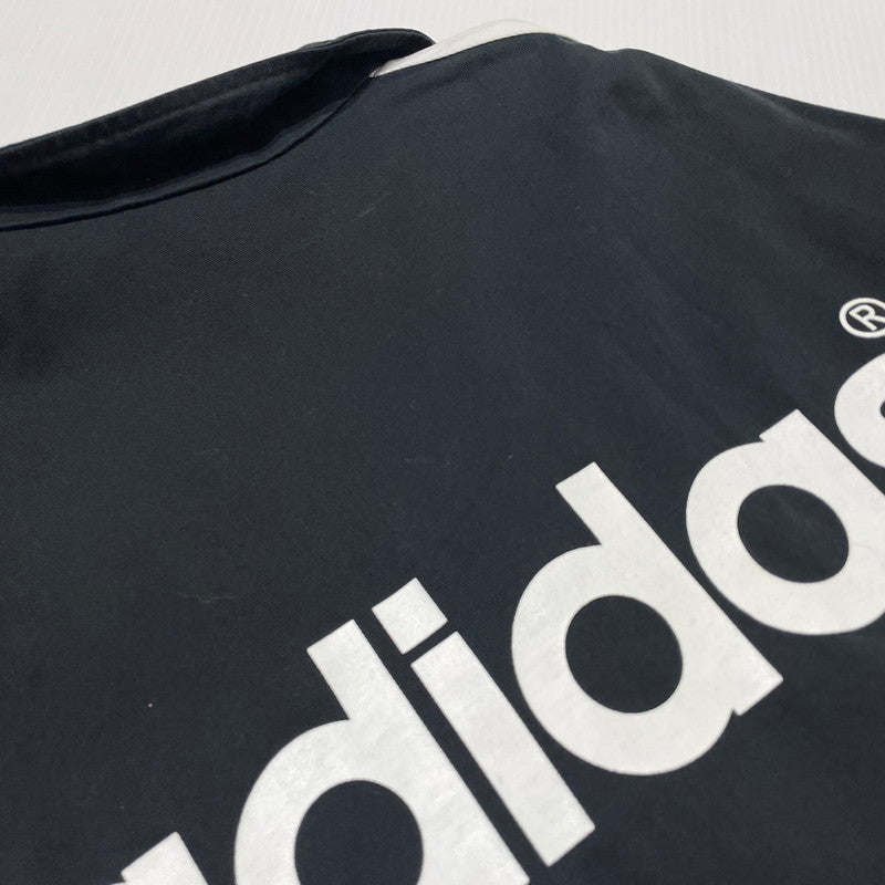 【中古品】【メンズ】 ADIDAS アディダス 80~90's SKIPPER-COLLAR PULLOVER JACKET VINTAGE 80~90年代 スキッパーカラー プルオーバー ジャケット ライトアウター デサント製 ヴィンテージ 148-261005-yo-07-teih サイズ:O-XO カラー:ブラック 万代Net店
