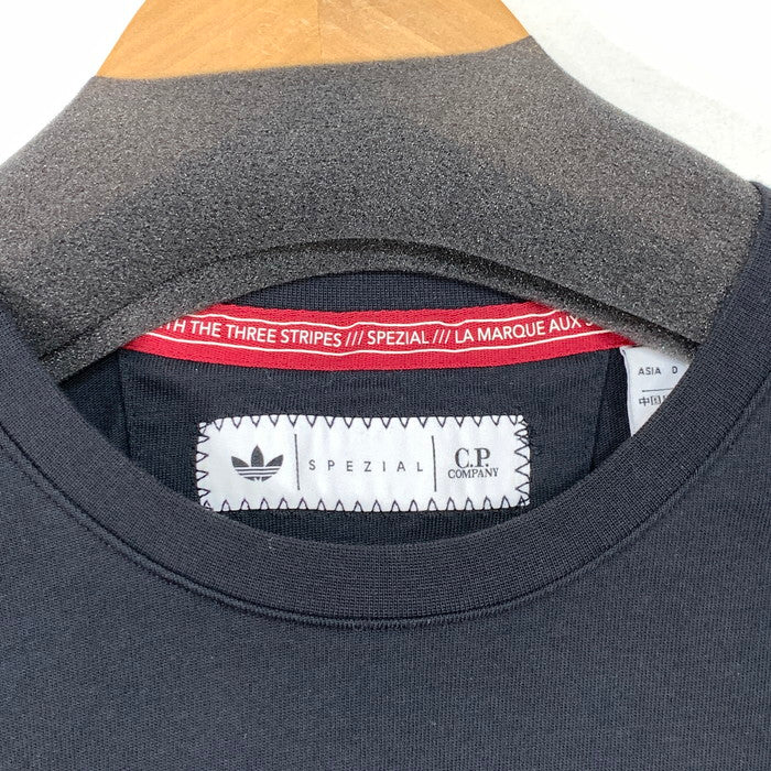 【中古品】【メンズ】 C.P.COMPANY×ADIDAS シーピーカンパニー×アディダス SPZL POCKET LS TEE 長袖Tシャツ ブランド 古着 141-260411-gm-25-fuz サイズ：L カラー：ブラック 万代Net店