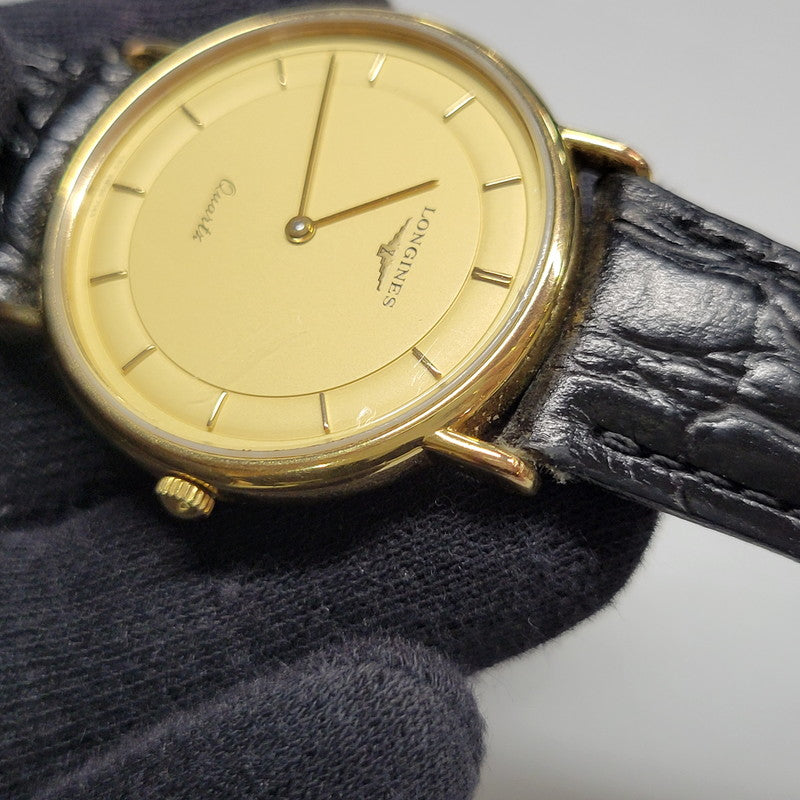 【現状渡し品】【メンズ/レディース】 LONGINES ロンジン ROUND FACE QUARTS 24742139 ラウンドフェイス クォーツ ゴールド文字盤 腕時計 197-250522-ay-17-izu カラー：ブラック×ゴールド 万代Net店