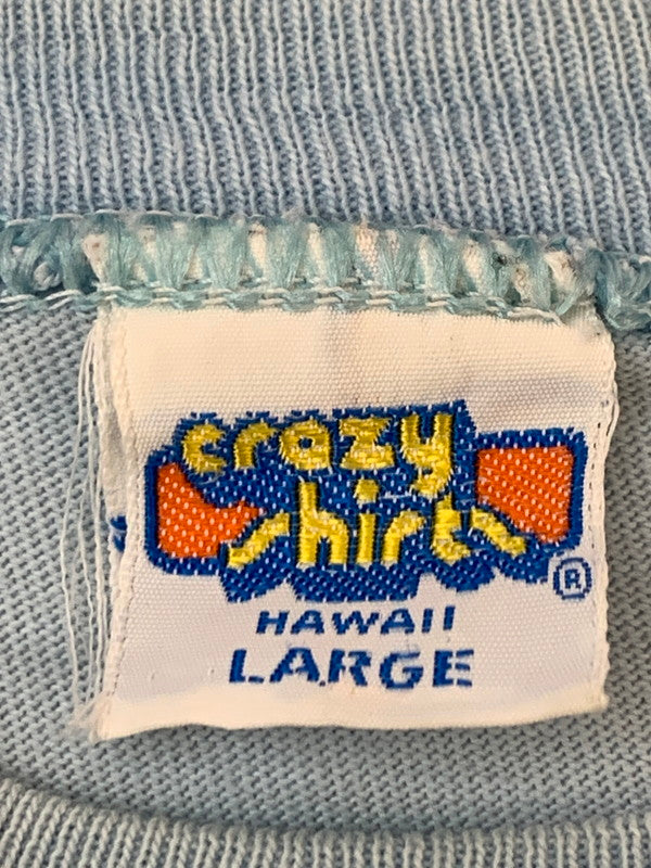 【現状渡し品】【メンズ】 CRAZY SHIRT クレイジーシャツ 70S ”MAVI” TEE HAWAII 1977 ハワイ 半袖Tシャツ 146-260610-kt-13-min サイズ：L カラー：ブルー 万代Net店
