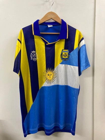 【中古品】【メンズ】 USED ユーズド FAN BOOTLEG SHIRT EL JARDIN DE OSCAR ユニホーム トップス Ｔシャツ メンズ サッカー スポーツ 146-250822-em-03-min サイズ：40 カラー：ブルー/イエロー 万代Net店