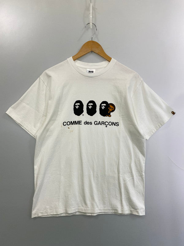 【中古品】【メンズ】 COMME des GARCONS コムデギャルソン × A BATHING APE アベイシングエイプ 別注 コラボ OSAKA BABY MILO S/S TEE 002TEJ221901C オオサカ ベイビーマイロ ショートスリーブ Tシャツ 半袖 トップス 140-251210-kk-28-min サイズ：L カラー：ホワイト 万代Net店