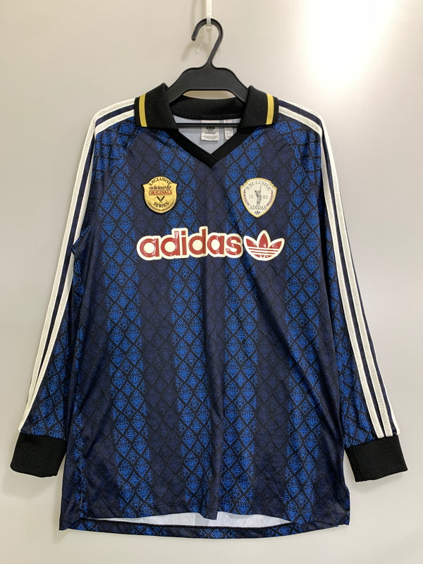 【中古品】【メンズ】 ADIDAS アディダス ORIGINALS RETRO SPORTS CRICKET－INSPIRED LONG S 長袖 ソングスリーブ ジャージ 148-260812-hu-20-min カラー：ブラック/ブルー 万代Net店