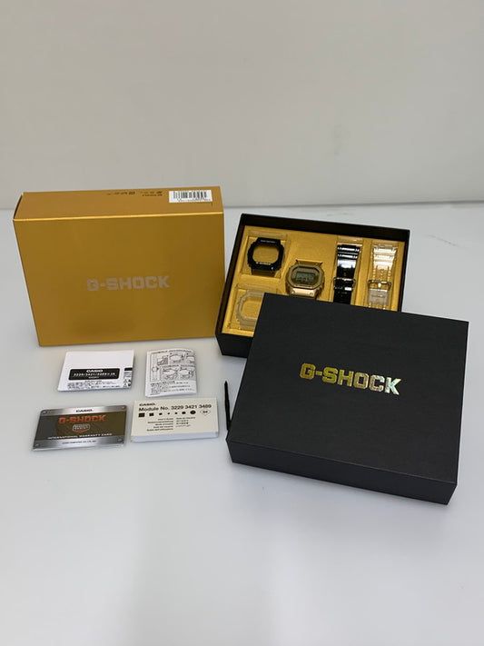 【中古美品】【メンズ/レディース】 CASIO カシオ G-SHOCK 5600 SERIES DWE-5600HG-1DR ジーショック 5600シリーズ 海外モデル クォーツ腕時計 196-260715-yn-33-min カラー：ゴールド 万代Net店