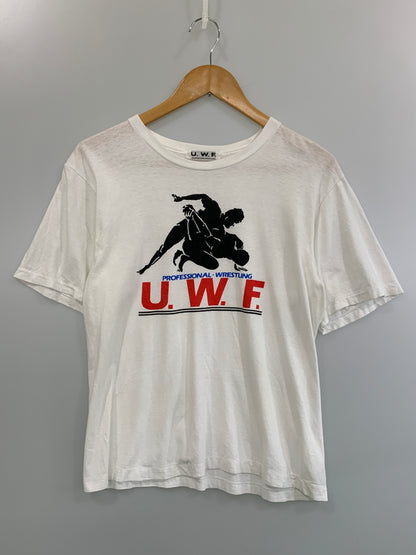 【中古品】【メンズ】 U.W.F. 80S PROFESSIONAL WRESTLING TEE ユニバーサル レスリング プロレス 半袖Tシャツ 146-260714-ta-20-min サイズ：サイズ不明 カラー：ホワイト 万代Net店