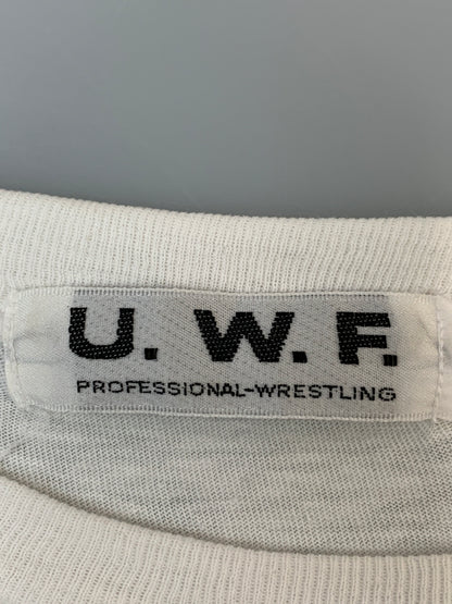 【中古品】【メンズ】 U.W.F. 80S PROFESSIONAL WRESTLING TEE ユニバーサル レスリング プロレス 半袖Tシャツ 146-260714-ta-20-min サイズ：サイズ不明 カラー：ホワイト 万代Net店