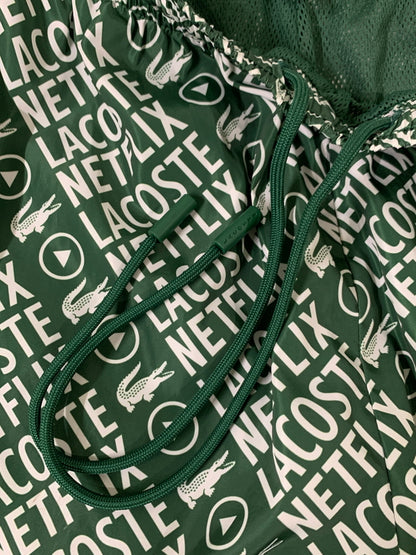 【中古品】【メンズ】 LACOSTE ラコステ ×NETFLIX ネットフリックス XH9342 NYLON EASY PANTS ナイロンイージーパンツ ボトムス 158-260718-AS-7-min サイズ：L カラー：グリーン/ホワイト 万代Net店