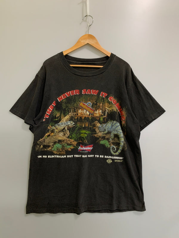 【現状渡し品】【メンズ】 BUDWEISER バドワイザー 90S THEY NEVER SAW IT COMING TEE 半袖Tシャツ 146-260714-ta-24-min サイズ：サイズ不明 カラー：ブラック系 万代Net店