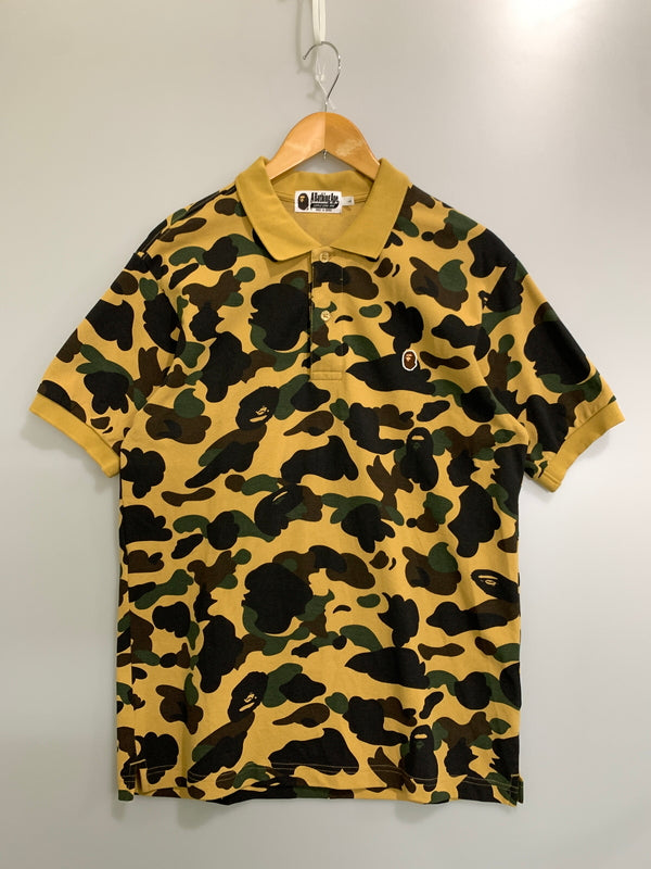 【中古品】【メンズ】 A BATHING APE アベイシングエイプ 1ST CAMO ONE POINT REGULAR FIT POLO SHIRT ファースト カモ ワンポイント レギュラー フィット ポロシャツ 半袖 メンズ 142-260723-em-40-min サイズ：L カラー：マスタード系 万代Net店