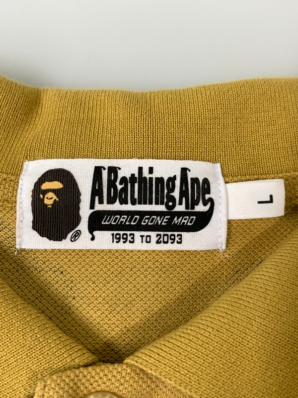 【中古品】【メンズ】 A BATHING APE アベイシングエイプ 1ST CAMO ONE POINT REGULAR FIT POLO SHIRT ファースト カモ ワンポイント レギュラー フィット ポロシャツ 半袖 メンズ 142-260723-em-40-min サイズ：L カラー：マスタード系 万代Net店