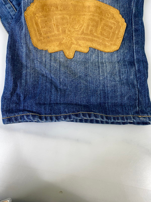 【現状渡し品】【メンズ】 NBA エヌビーエー LAKERS LEATHER PATCH DENIM PANTS レイカーズ レザー パッチ デニム パンツ メンズ ボトムス ジーンズ ワッペン 刺繍 バスケットボール ロサンゼルス 157-260904-em-25-min サイズ：W38 カラー：インディゴ 万代Net店