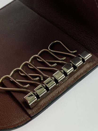 【中古品】【メンズ/レディース】 CARTIER カルティエ MUST DE CARTIER 6KEY CASE マスト ドゥ カルティエ 6キーケース 本革 181-260925-em-53-min カラー：ブラック 万代Net店