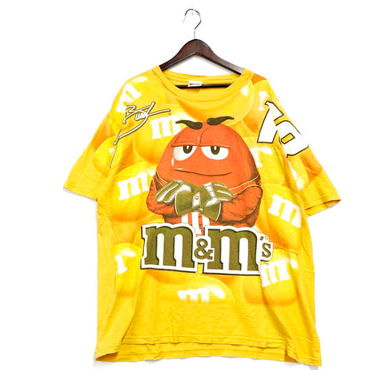 【中古品】【メンズ】 CHASER チェーサー M&M'S 90-00S フルグラフィック Tシャツ 半袖 トップス 146-240817-mm-07-izu サイズ：XL カラー：イエロー 黄 万代Net店