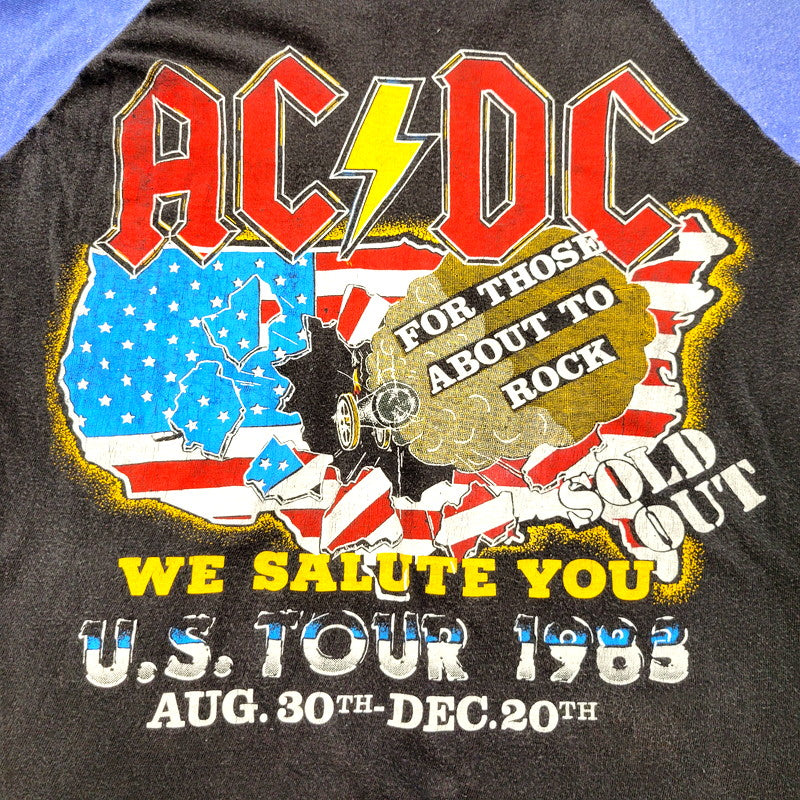 【中古品】【メンズ】  ACDC 80S WE SALUTE YOU U.S. TOUR 1983 RAGLAN TEE ラグラン Tシャツ 半袖 5分丈袖 トップス 146-240816-mm-03-izu サイズ：サイズ不明 カラー：ブラック 万代Net店