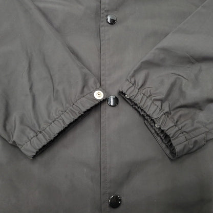 【中古品】【メンズ】 × UNDER COVER アンダーカバー LONG COACH JACKET 17-03780/UCT9206 ロング コーチ ジャケット ロゴ プリント アウター 140-250704-ay-03-izu カラー：ブラック 万代Net店