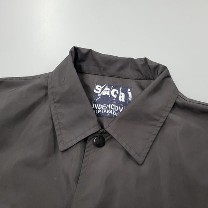 【中古品】【メンズ】 × UNDER COVER アンダーカバー LONG COACH JACKET 17-03780/UCT9206 ロング コーチ ジャケット ロゴ プリント アウター 140-250704-ay-03-izu カラー：ブラック 万代Net店