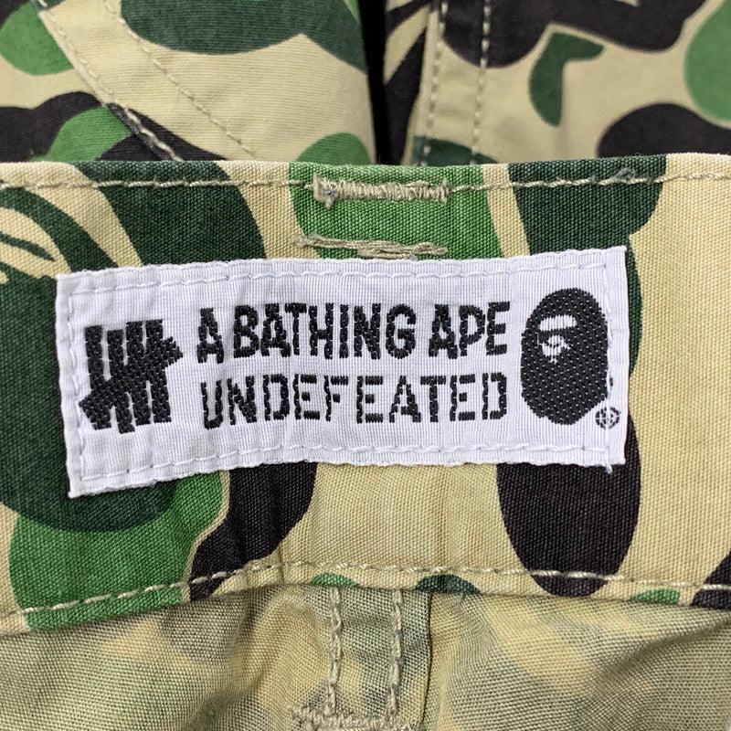 【中古品】【メンズ】 A BATHING APE アベイシングエイプ ×UNDEFEATED アンディーフィーテッド 001PTE231903X ABC 6 POCKET ポケット PANTS パンツ ズボン ボトムス 153-251104-ya-05-izu サイズ：S カラー：グリーン系 万代Net店