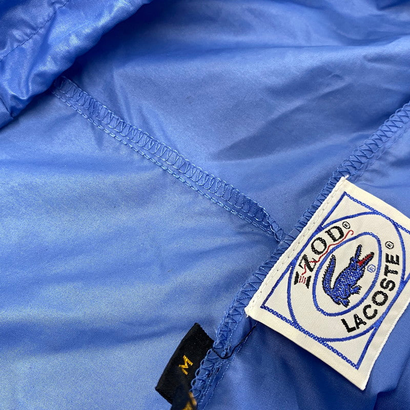 【中古品】【メンズ】 IZOD LACOSTE アイゾッド ラコステ NYLON ANORAK HOODIE ナイロン アノラック フーディー 青円糸巻タグ 146-260607-as-27-izu サイズ：M カラー：ライトブルー 万代Net店