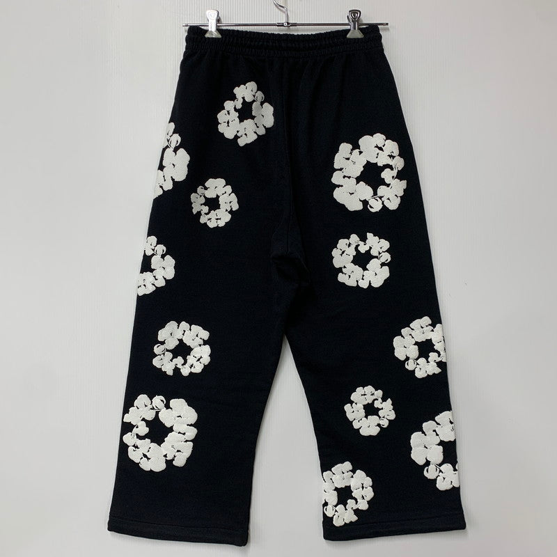 【中古品】【メンズ】 DENIM TEARS デニムティアーズ COTTON WREATH BAGGY SWEATPANTS コットン リース バギー スウェットパンツ ズボン ボトムス 153-260428-ya-06-izu サイズ：XS カラー：BLACK 万代Net店