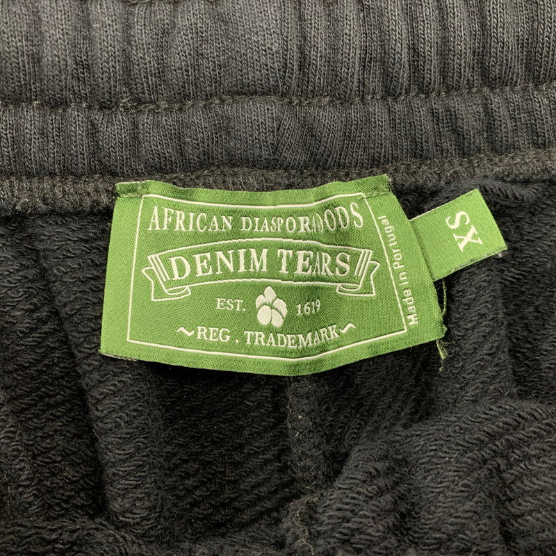 【中古品】【メンズ】 DENIM TEARS デニムティアーズ COTTON WREATH BAGGY SWEATPANTS コットン リース バギー スウェットパンツ ズボン ボトムス 153-260428-ya-06-izu サイズ：XS カラー：BLACK 万代Net店