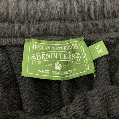 【中古品】【メンズ】 DENIM TEARS デニムティアーズ COTTON WREATH BAGGY SWEATPANTS コットン リース バギー スウェットパンツ ズボン ボトムス 153-260428-ya-06-izu サイズ：XS カラー：BLACK 万代Net店