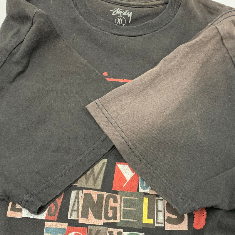 【現状渡し品】【メンズ】 STUSSY ステューシー 金タグ GRAPHIC WORLD TOUR TEE グラフィック ワールド ツアー Tシャツ トップス 半袖 142-260606-ya-11-izu サイズ：XL カラー：BLACK 万代Net店