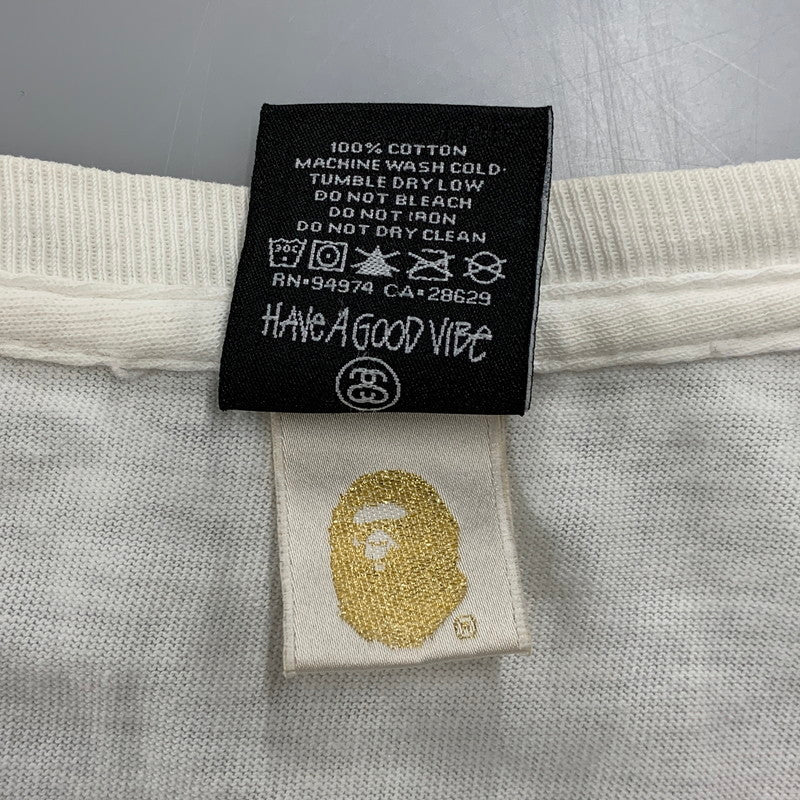 【中古品】【メンズ】 SYUSSY×A BATHING APE ステューシー×アベイシングエイプ メキシコ製 ILL COLLABORATION TEE イル コラボレーション ティー トップス 長袖 142-260611-cs-08-izu サイズ：XL カラー：ホワイト 万代Net店