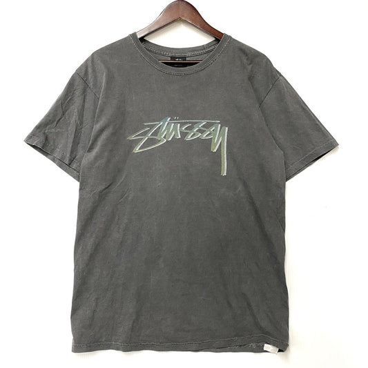 【中古品】【メンズ】 STUSSY ステューシー メキシコ製 CENTER LOGO BACK SURFMAN PRINT SS TEE センター ロゴ バック サーフマン プリント ショートスリーブ Tシャツ トップス 142-260610-kh-07-izu サイズ：M カラー：チャコール系 万代Net店