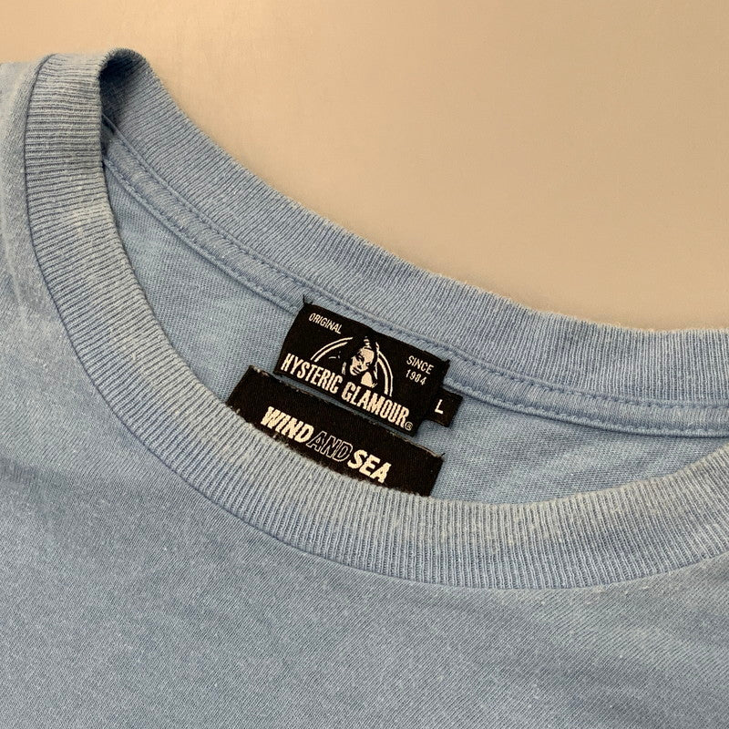 【中古品】【メンズ】 HYSTERIC GLAMOUR ヒステリックグラマー × WIND AND SEA ウィンダンシー 02203CL14 20AW GRAPHIC L S TEE グラフィック ロングスリーブ Tシャツ トップス 長袖 140-260612-ya-04-izu サイズ：L カラー：ライトブルー 万代Net店