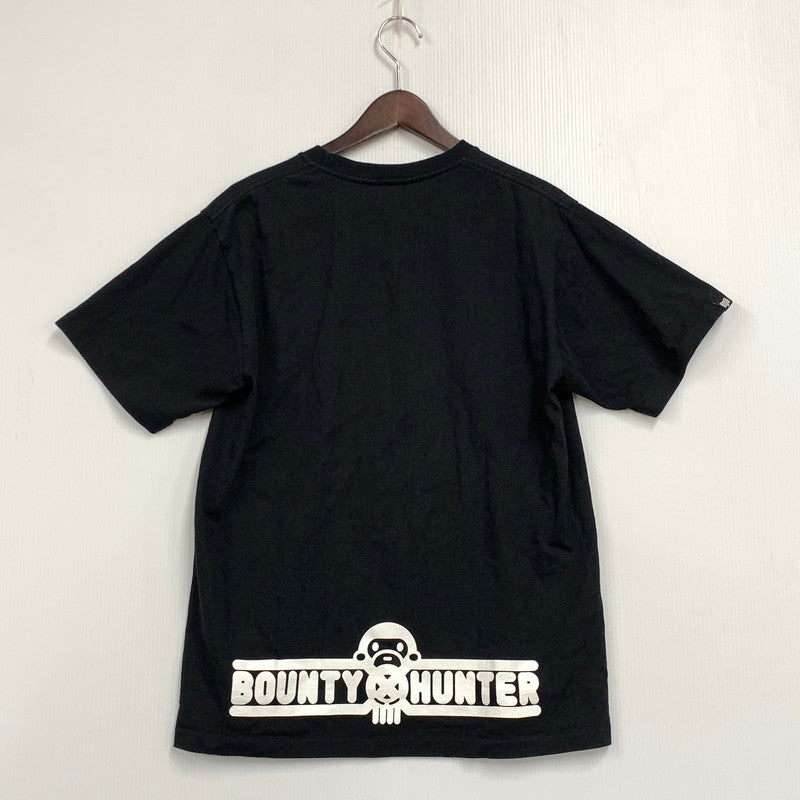 【中古品】【メンズ】 A BATHING APE アベイシングエイプ × BOUNTY HUNTER バウンティ ハンター BABY MILO ベイビーマイロ S S TEE ショートスリーブ Tシャツ トップス 半袖 142-260612-ya-05-izu サイズ：L カラー：ブラック 万代Net店
