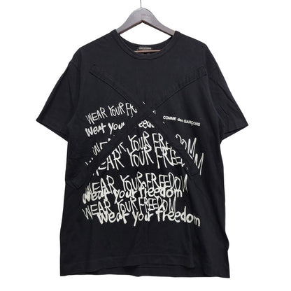 【中古品】【メンズ】 COMME des GARCONS HOMME PLUS コムデギャルソンオムプリュス WEAR YOUR FREEDOM CROSS S/S TEE PE-T066 AD2018 クロス Tシャツ 半袖 140-260702-as-15-izu サイズ：L カラー：ブラック 万代Net店