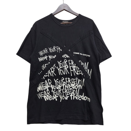 【中古品】【メンズ】 COMME des GARCONS HOMME PLUS コムデギャルソンオムプリュス WEAR YOUR FREEDOM CROSS S/S TEE PE-T066 AD2018 クロス Tシャツ 半袖 140-260702-as-15-izu サイズ：L カラー：ブラック 万代Net店