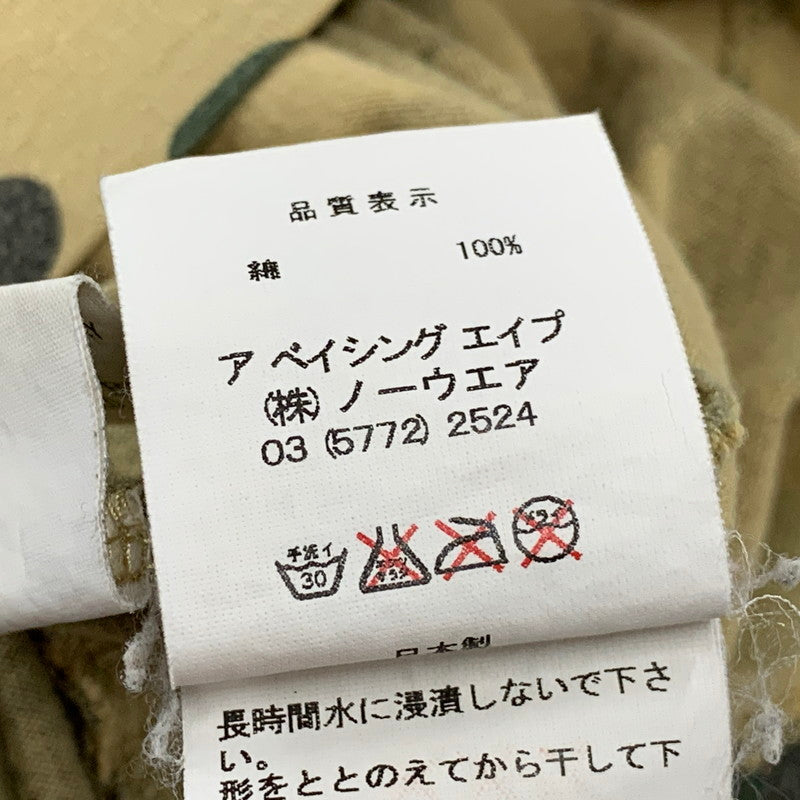 【中古品】【メンズ】 A BATHING APE アベイシングエイプ × KAWS カウズ 1ST CAMO BAPE LOGO S S TEE カモ ベイプ ロゴ ショートスリーブ Tシャツ トップス 半袖 142-260724-ya-10-izu サイズ：L カラー：ベージュ系 万代Net店