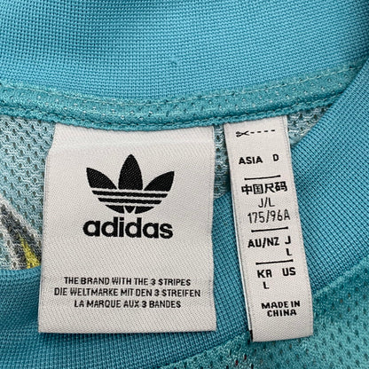 【中古品】【メンズ】 ADIDAS アディダス × SEAN WOTHERSPOON ショーン・ウォザースプーン × HOT WHEELS ホットウィール HT6581 MESH L S TEE メッシュ ロングスリーブ Tシャツ トップス 長袖 142-260810-ya-02-izu サイズ：L カラー：ターコイズブルー 万代Net店
