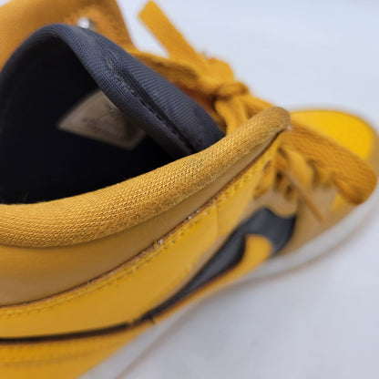 【中古品】【レディース】 NIKE ナイキ WMNS AIR JORDAN 1 MID BQ6472-700 ウィメンズ エア ジョーダン 1 ミッド スニーカー 靴 166-260921-as-23-izu サイズ：23.5cm カラー：UNIVERSITY GOLD/BLACK-WHITE 万代Net店