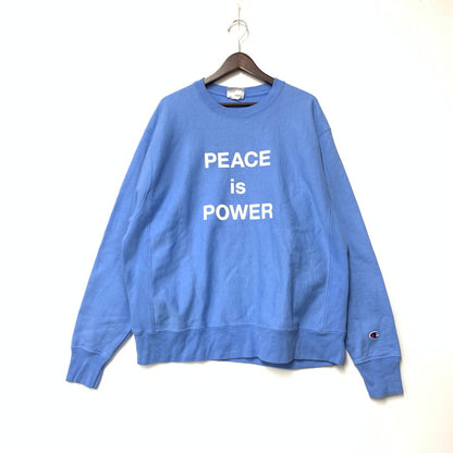 【中古品】【メンズ】 CHAMPION チャンピオン×MOMA YOKO ONO PEACE IS POWER REVERSE WEAVE SWEATSHIRT モマ ヨーコ・オノ ピース イズ パワー リバースウィーブ スウェットシャツ トップス 長袖 140-261027-ya-14-izu サイズ：2XL カラー：ライトブルー 万代Net店