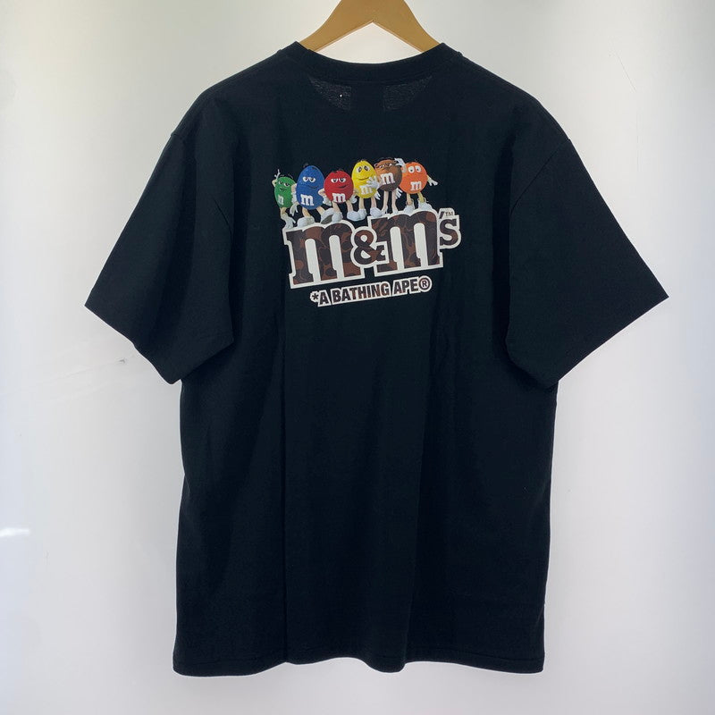 【中古美品】【メンズ】 A BATHING APE 001TEH231934X M&M`S T-SHIRT アベイシングエイプ 142-250826-st-02-fuz サイズ：XL カラー：ブラック 万代Net店