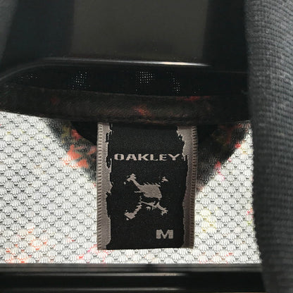 【中古品】【メンズ】 OAKLEY オークリー ナイロンジャケット BROWN.総柄 SIZE:M 上着 ジャケット 148-260811-io-38-fuzh カラー：ブラウン 万代Net店