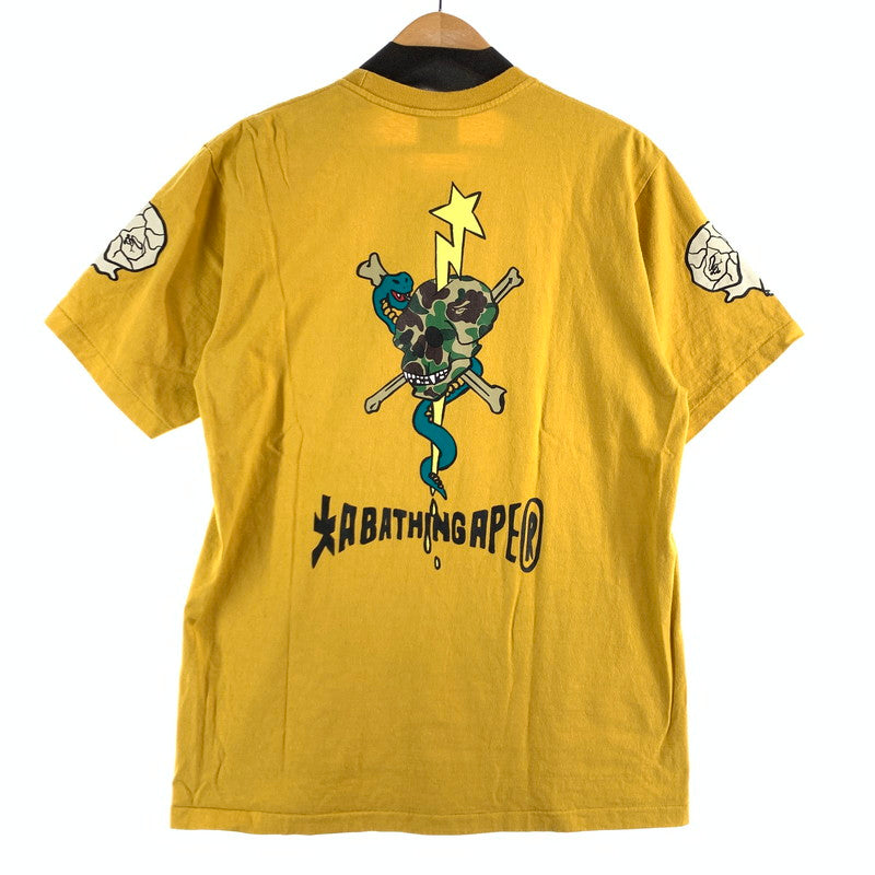 【中古品】【メンズ】 A BATHING APE アベイシングエイプ 001TEK801052M SOUVENIR SKULL TEAM GRAPHIC TEE スーベニア スカル チーム グラフィック ティー 142-260707-ny-09-fuzh サイズ：L カラー：イエロー 万代Net店