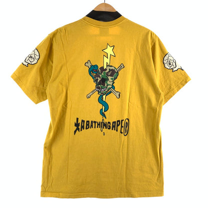 【中古品】【メンズ】 A BATHING APE アベイシングエイプ 001TEK801052M SOUVENIR SKULL TEAM GRAPHIC TEE スーベニア スカル チーム グラフィック ティー 142-260707-ny-09-fuzh サイズ：L カラー：イエロー 万代Net店