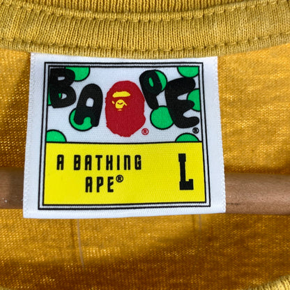 【中古品】【メンズ】 A BATHING APE アベイシングエイプ 001TEK801052M SOUVENIR SKULL TEAM GRAPHIC TEE スーベニア スカル チーム グラフィック ティー 142-260707-ny-09-fuzh サイズ：L カラー：イエロー 万代Net店