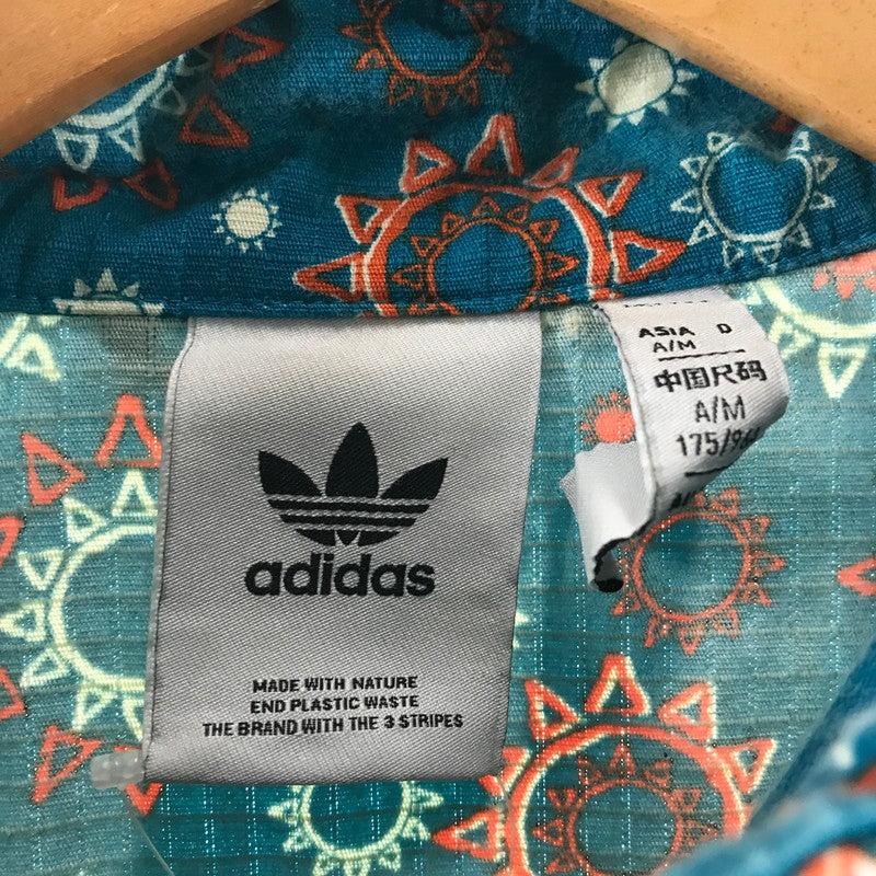 【中古品】【メンズ】 ADIDAS アディダス HR4273 ADVENTURE WINDBREAKER ウインドブレーカー カラーGREEN 太陽総柄 SIZE:L 148-260804-ky-07-fuzh 万代Net店