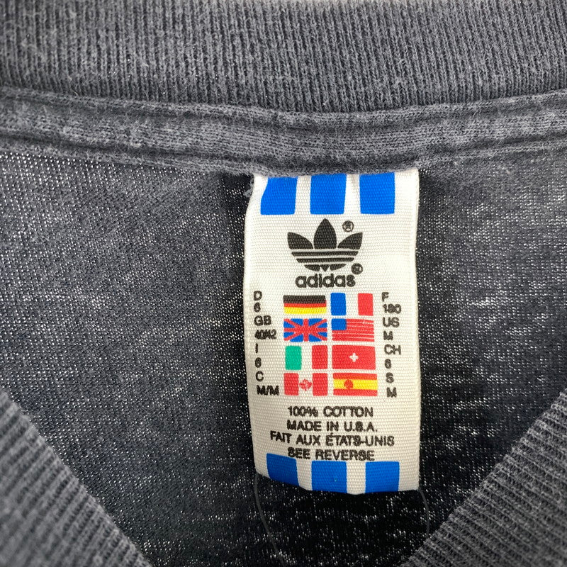 【中古品】【メンズ】 ADIDAS アディダス 80年代 半袖Tシャツ Tシャツ BLACK.JENSEN SIZE:M 万国旗 USA製 ※シミ有 148-260920-io-02-fuzh 万代Net店