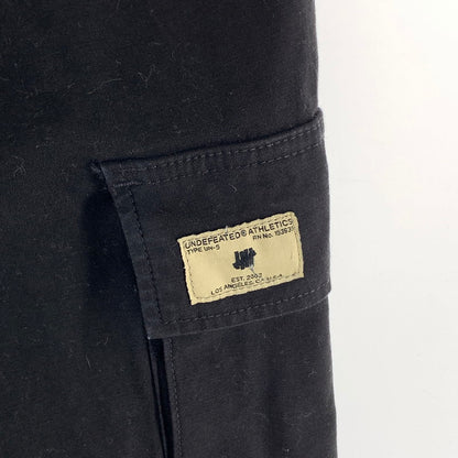 【中古品】【メンズ】 UNDEFEATED アンディフィーテッド カーゴパンツ ボトムス ブランド 古着 153-260921-gm-09-fuzh サイズ：M カラー：ブラック 万代Net店