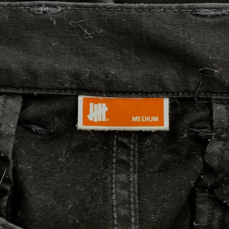 【中古品】【メンズ】 UNDEFEATED アンディフィーテッド カーゴパンツ ボトムス ブランド 古着 153-260921-gm-09-fuzh サイズ：M カラー：ブラック 万代Net店