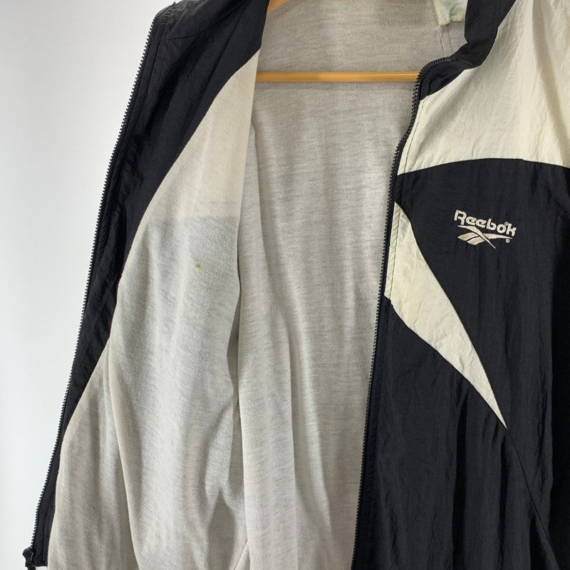 【中古品】【メンズ】 REEBOK リーボック NYLON JACKET ナイロンジャケット ブルゾン 古着 145-261018-gm-17-fuzh サイズ：L カラー：ブラック ホワイト 万代Net店