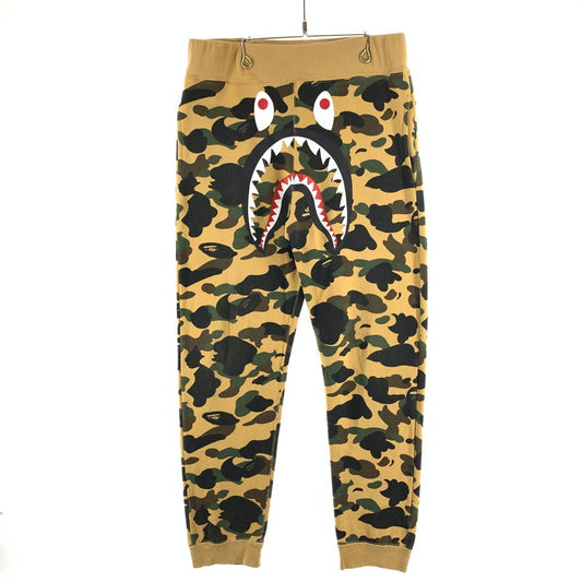 【中古品】【メンズ】 A BATHING APE アベイシングエイプ 1ST CAMO SHARK SWEAT PANTS カモシャークスウェットパンツ ボトムス 153-261010-gm-29-fuzh サイズ：L カラー：カモフラ 万代Net店