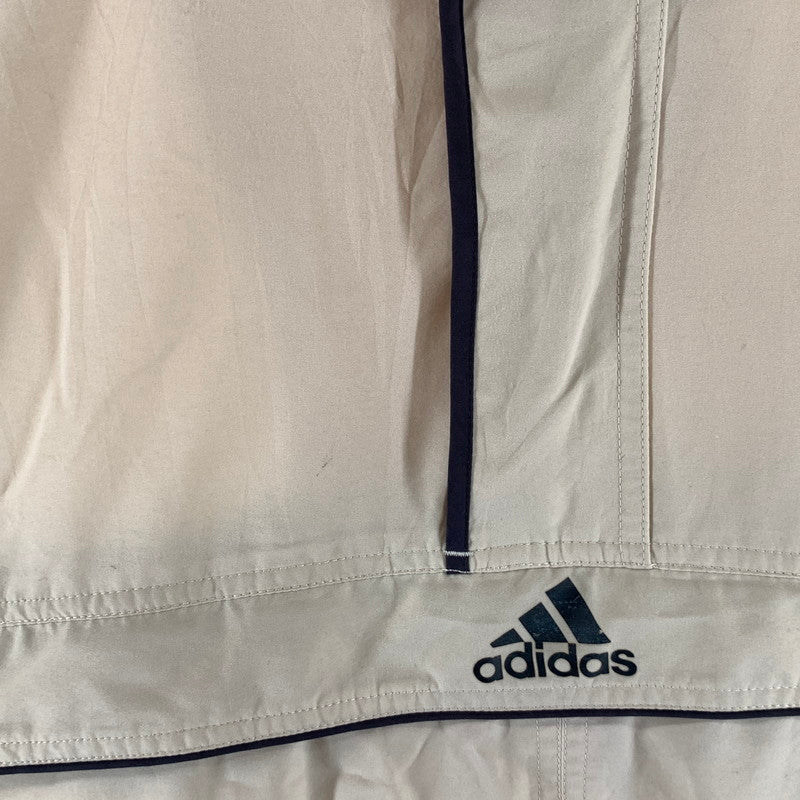 【中古品】【メンズ】 ADIDAS アディダス アノラックパーカー 万国旗タグ 古着 ジャケット ブルゾン 148-261018-gm-16-fuzh サイズ：2XO カラー：ベージュ 万代Net店