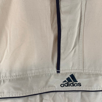 【中古品】【メンズ】 ADIDAS アディダス アノラックパーカー 万国旗タグ 古着 ジャケット ブルゾン 148-261018-gm-16-fuzh サイズ：2XO カラー：ベージュ 万代Net店