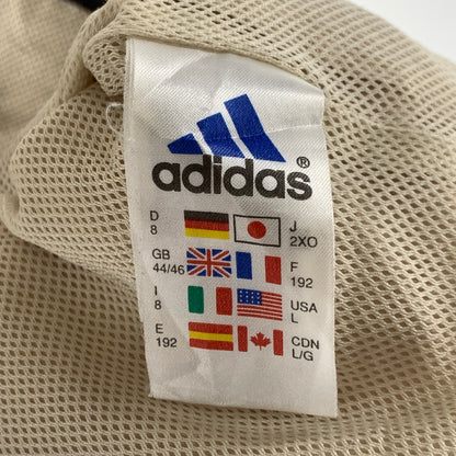 【中古品】【メンズ】 ADIDAS アディダス アノラックパーカー 万国旗タグ 古着 ジャケット ブルゾン 148-261018-gm-16-fuzh サイズ：2XO カラー：ベージュ 万代Net店